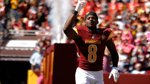 Oct 9, 2022; Landover, Maryland, USA; Washington Commanders running back Brian Robinson (8) is introduced prior to the start of the Commanders' game against the Tennessee Titans at FedExField. Mandatory Credit: Geoff Burke-USA TODAY Sports